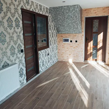 біля річки Privatunterkunft